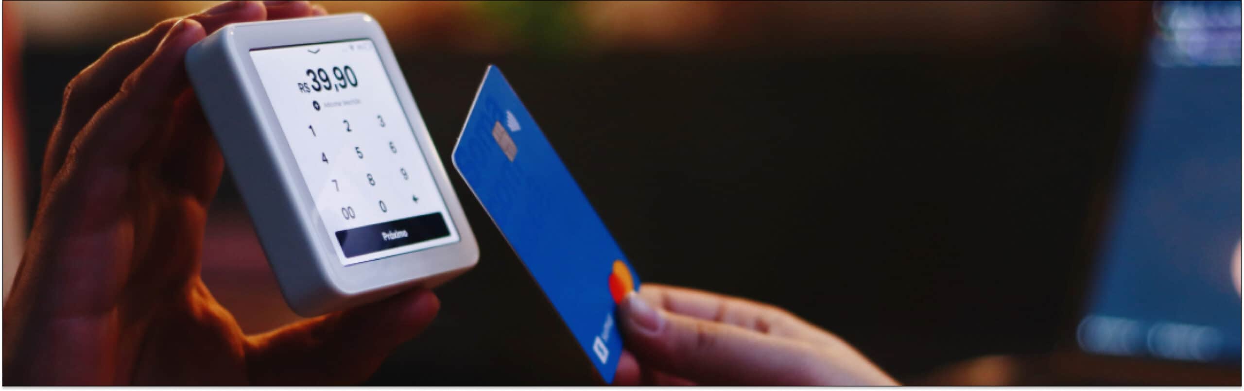 A person tapping a credit card